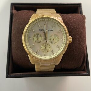 Michael Kors Watch - Mother of pearl color.  MK - 5039. Requires battery.